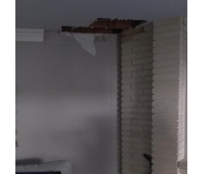 Ceiling pipe burst in family room.